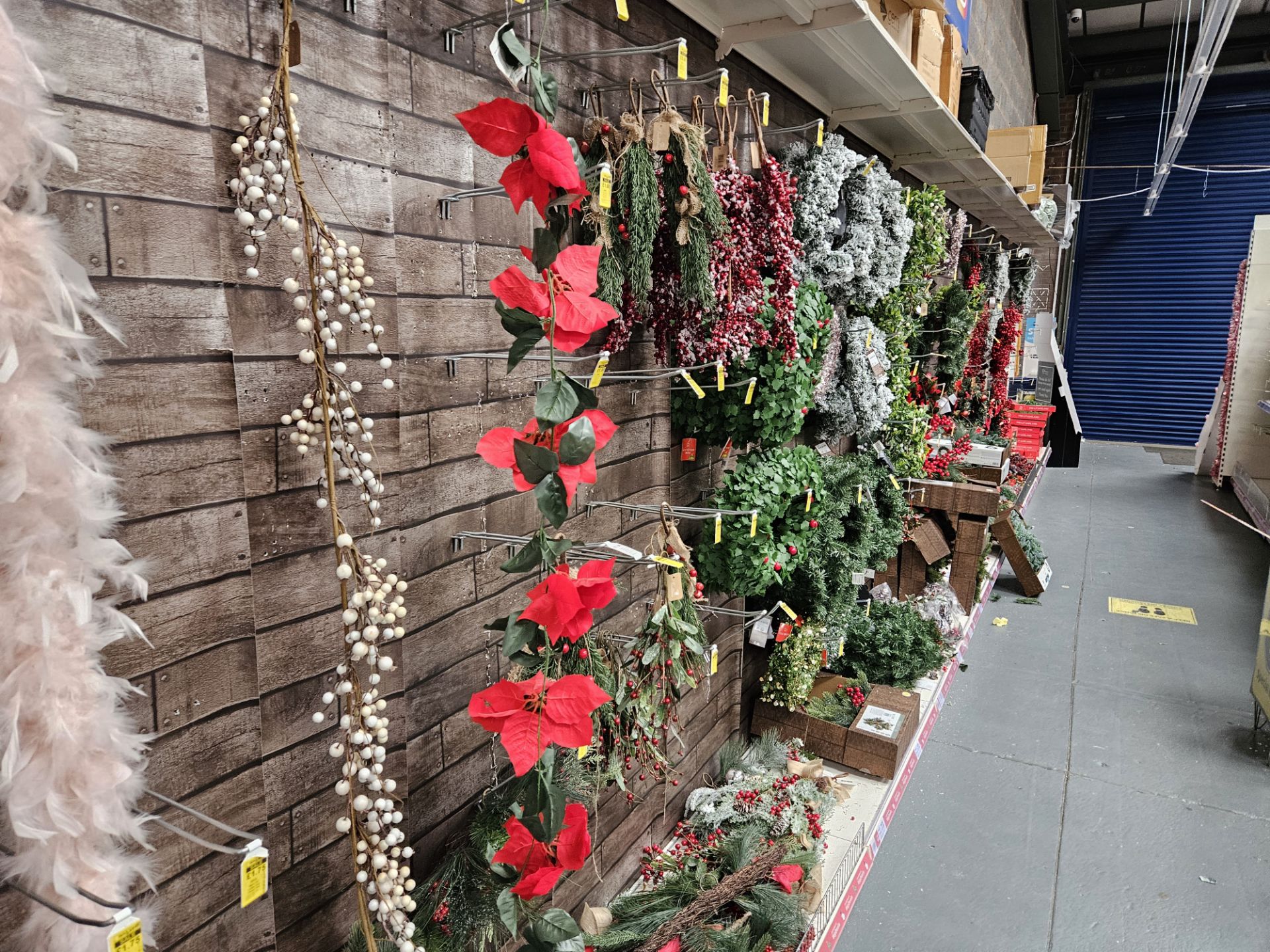 Large quantity of fake christmas foliage to include wreaths, garlands branches & flowers. - Image 2 of 7