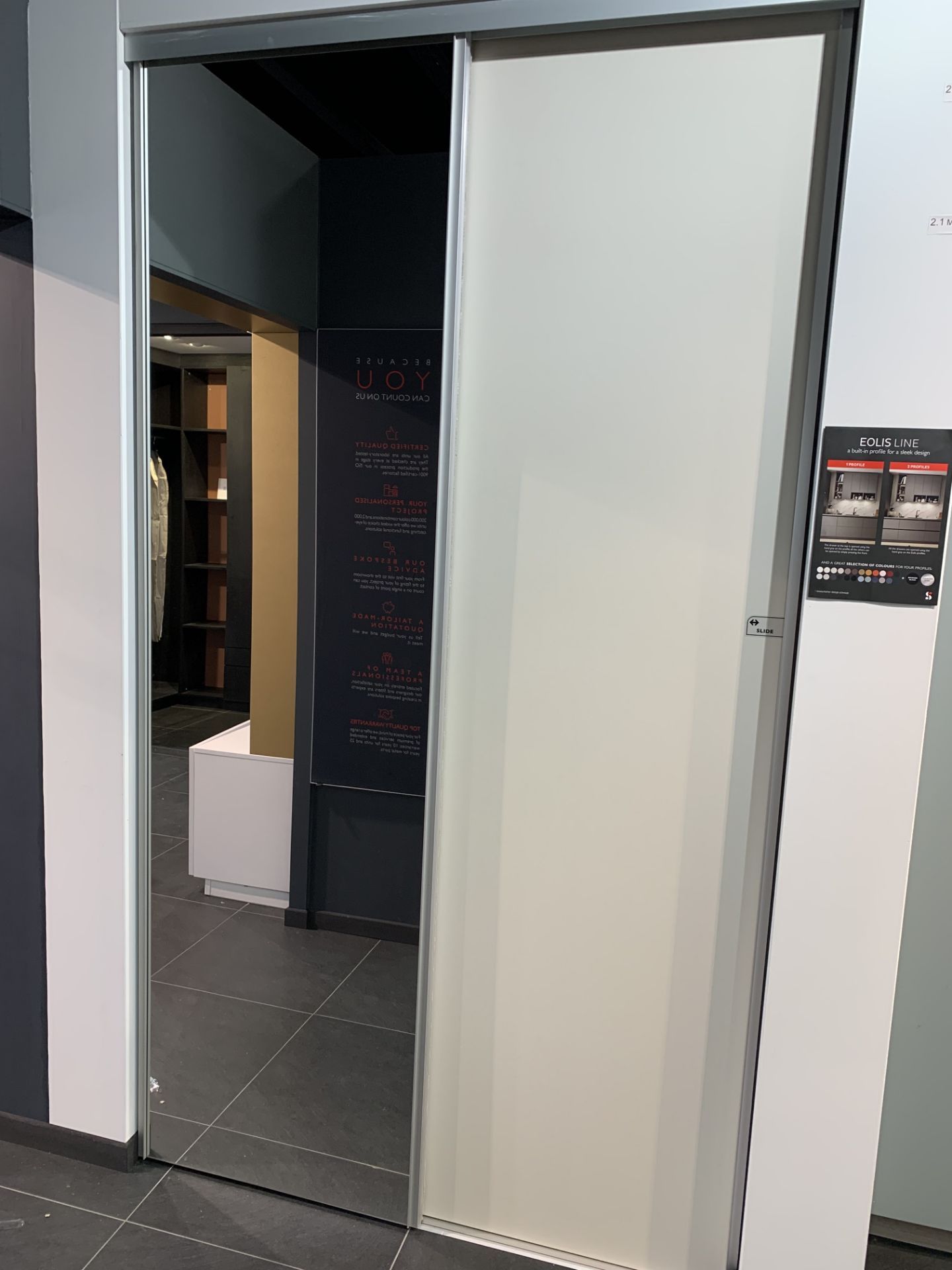 Fitted wardrobe unit with sliding doors