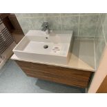 Display bathroom sink and floating pedestal