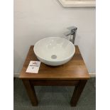 Display bathroom sink on pedestal table