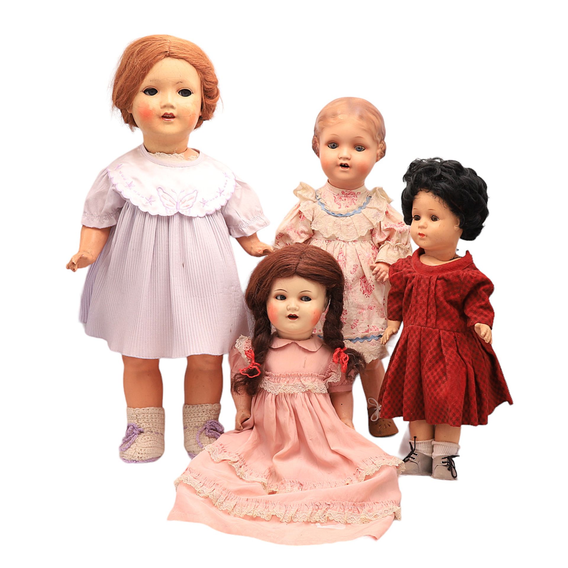 Vier Puppen, verschiedene Hersteller