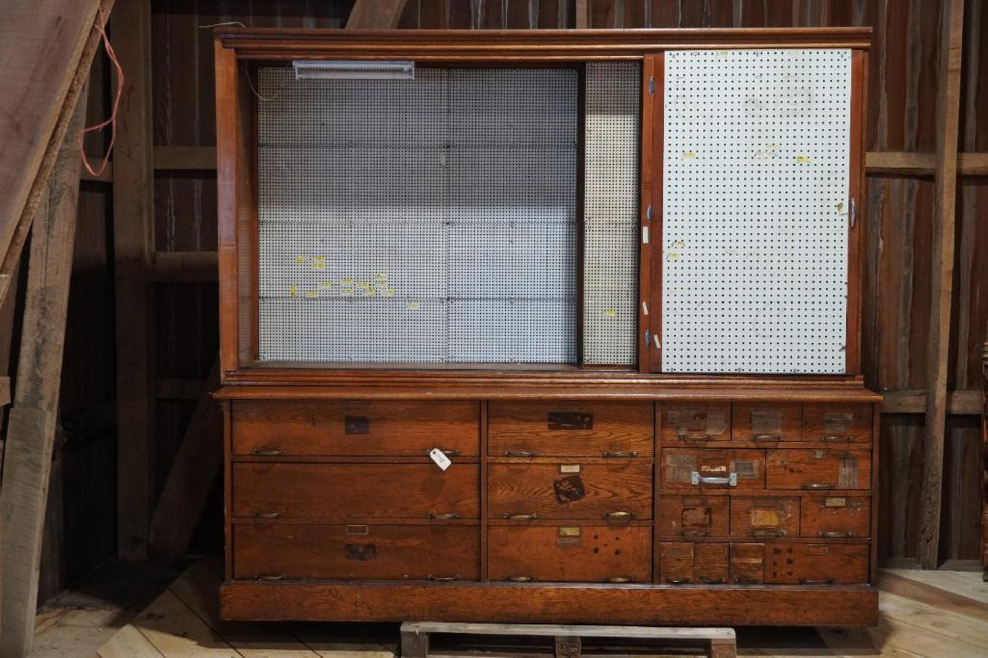 Early Oak Hardware Cabinet