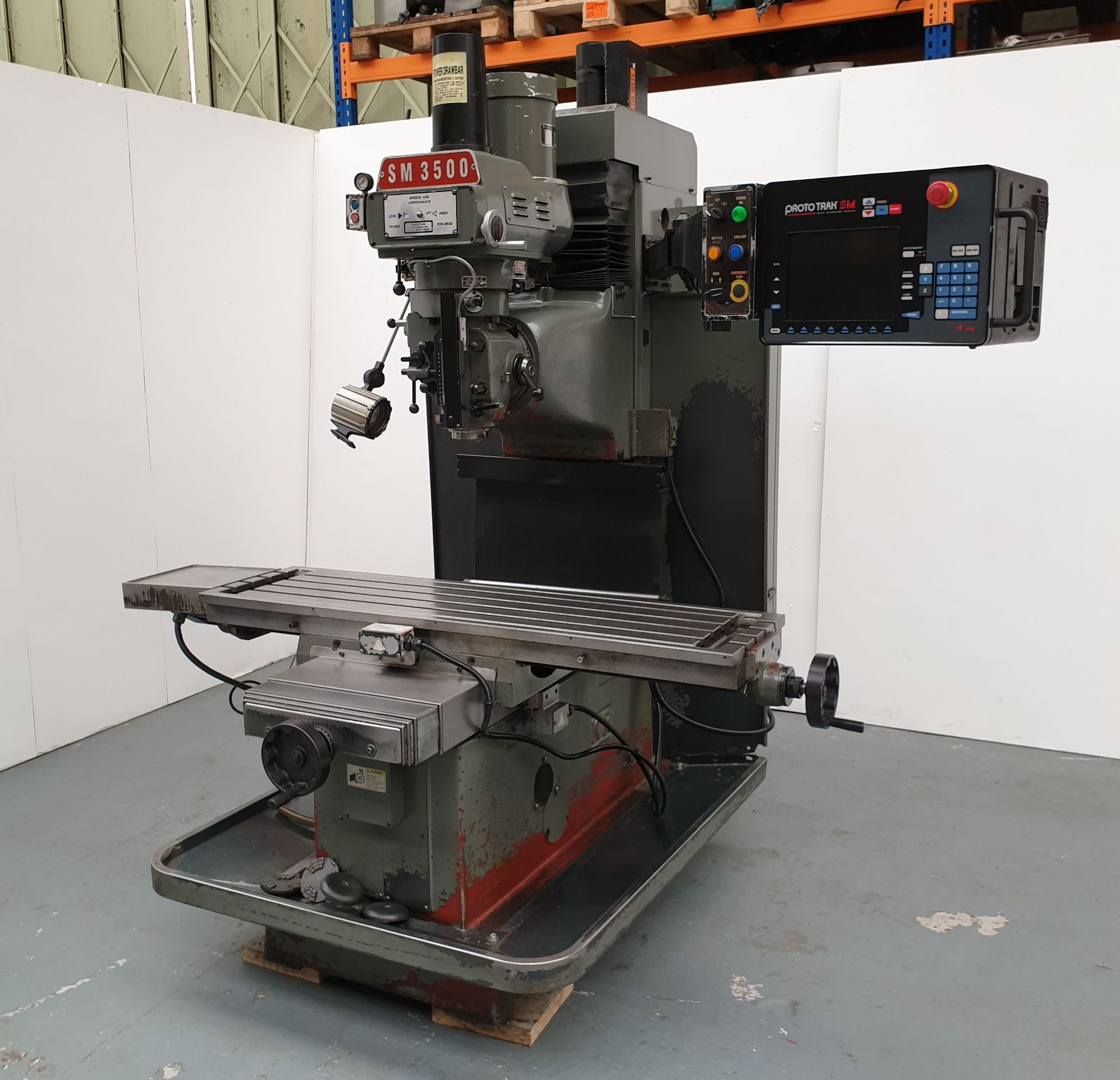 KRV Model DPM 3 Axis CNC Bed Mill With ProtoTrak SM Control. Table Size: 54" x 14".