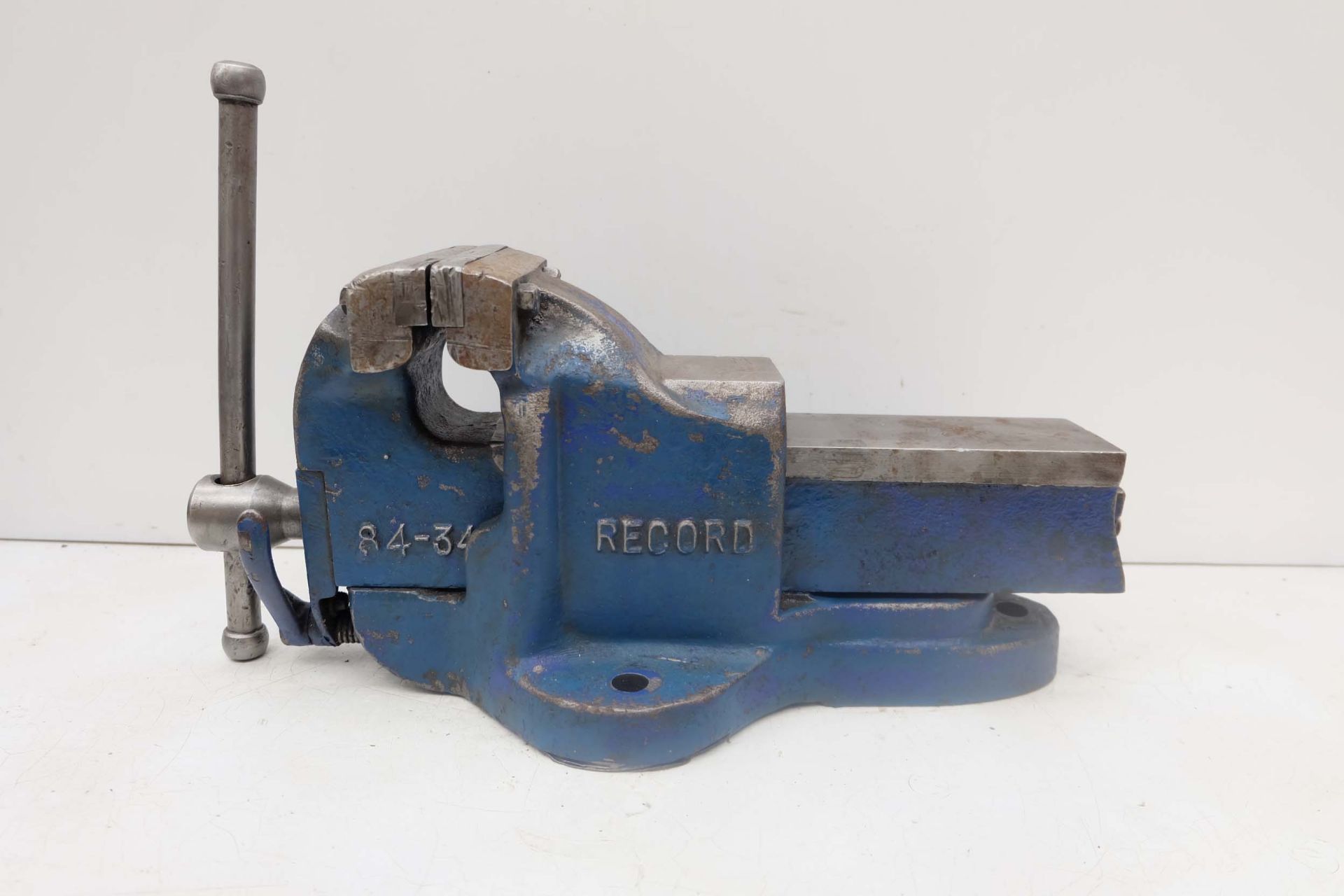 Record 84 - 34 Engineers Bench Vice. Width of Jaws 4 1/2". Maximum Opening 6". With Quick Release.