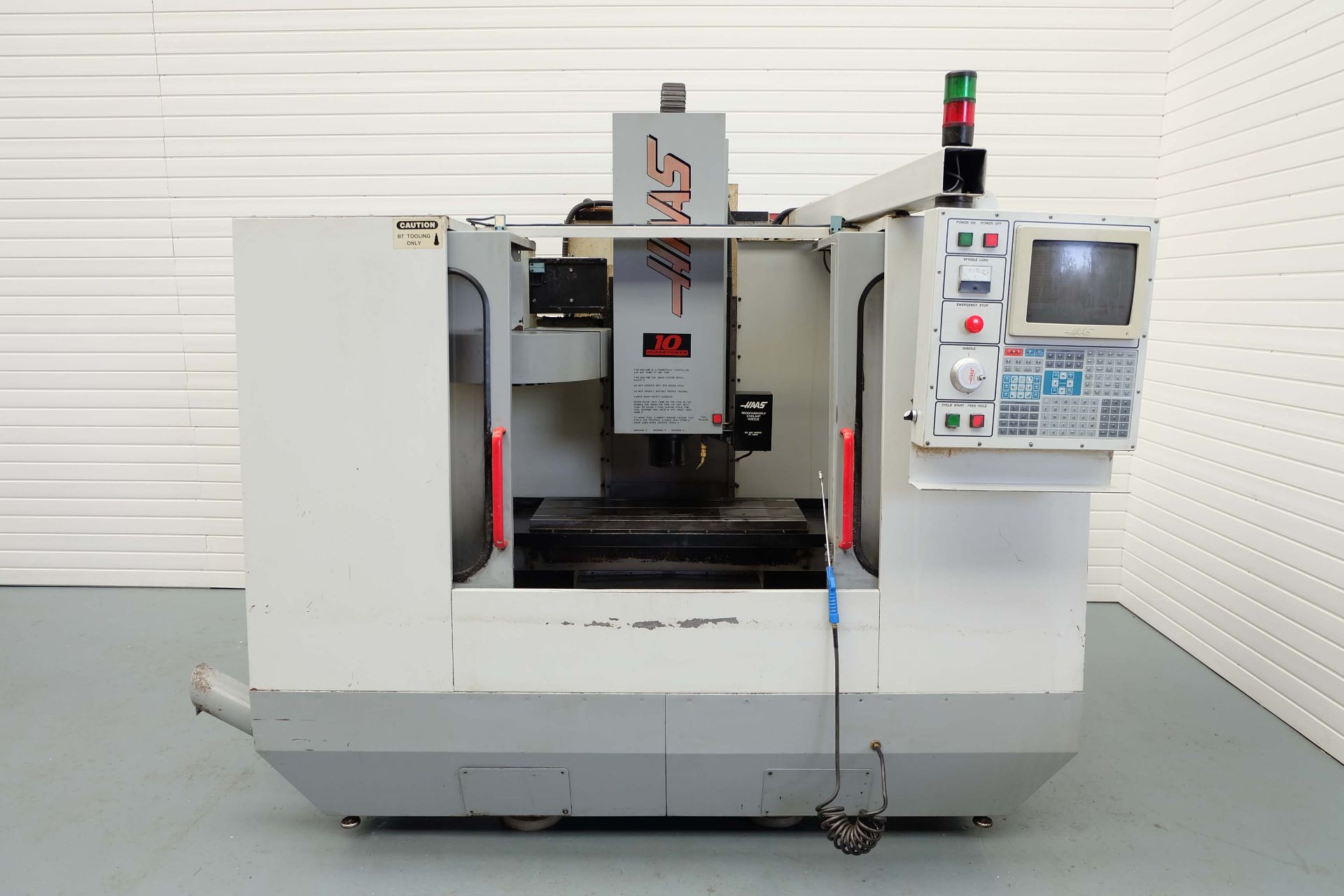 HAAS Model 2 Three Axis Vertical Maching Centre With 20 Station Auto Tool Changer. Table Size: 36" x