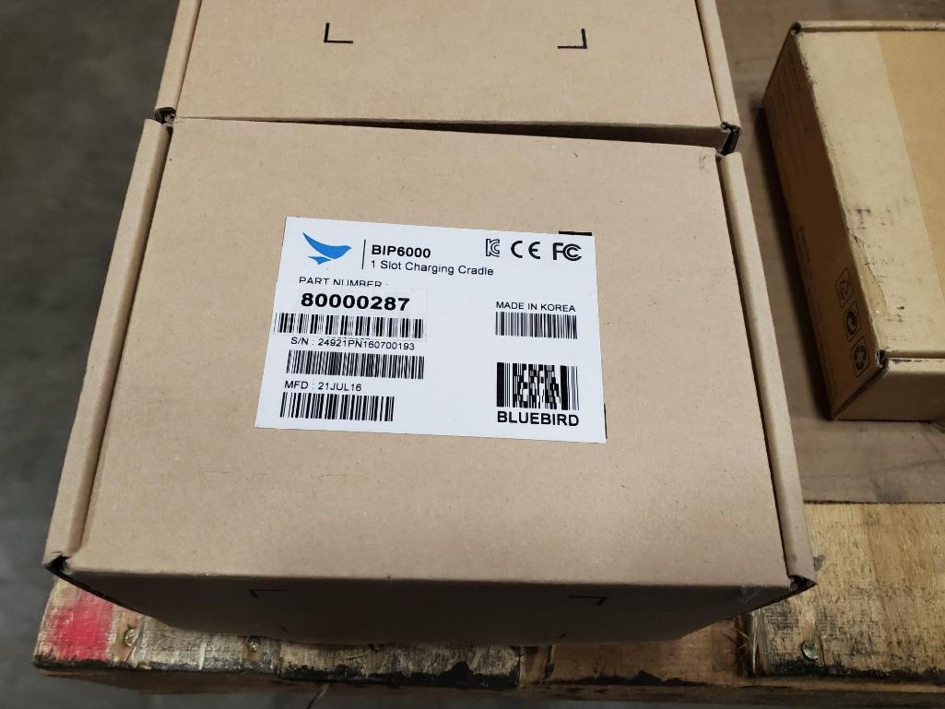 Pallet of assorted new in box Psion Bluebird scanner cradles and power adapters. - Image 2 of 10