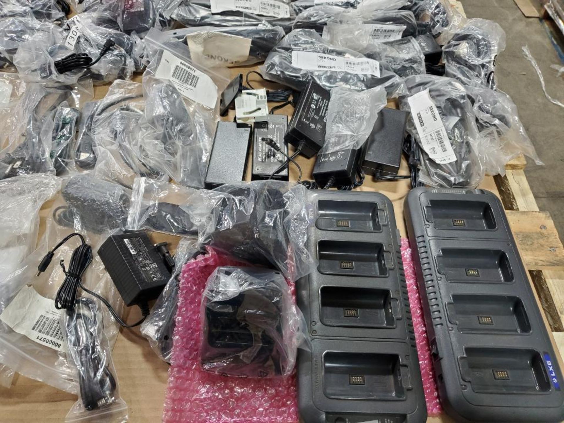 Pallet of assorted new out of box Psion Bluebird scanner cradles and power adapters. - Image 8 of 11