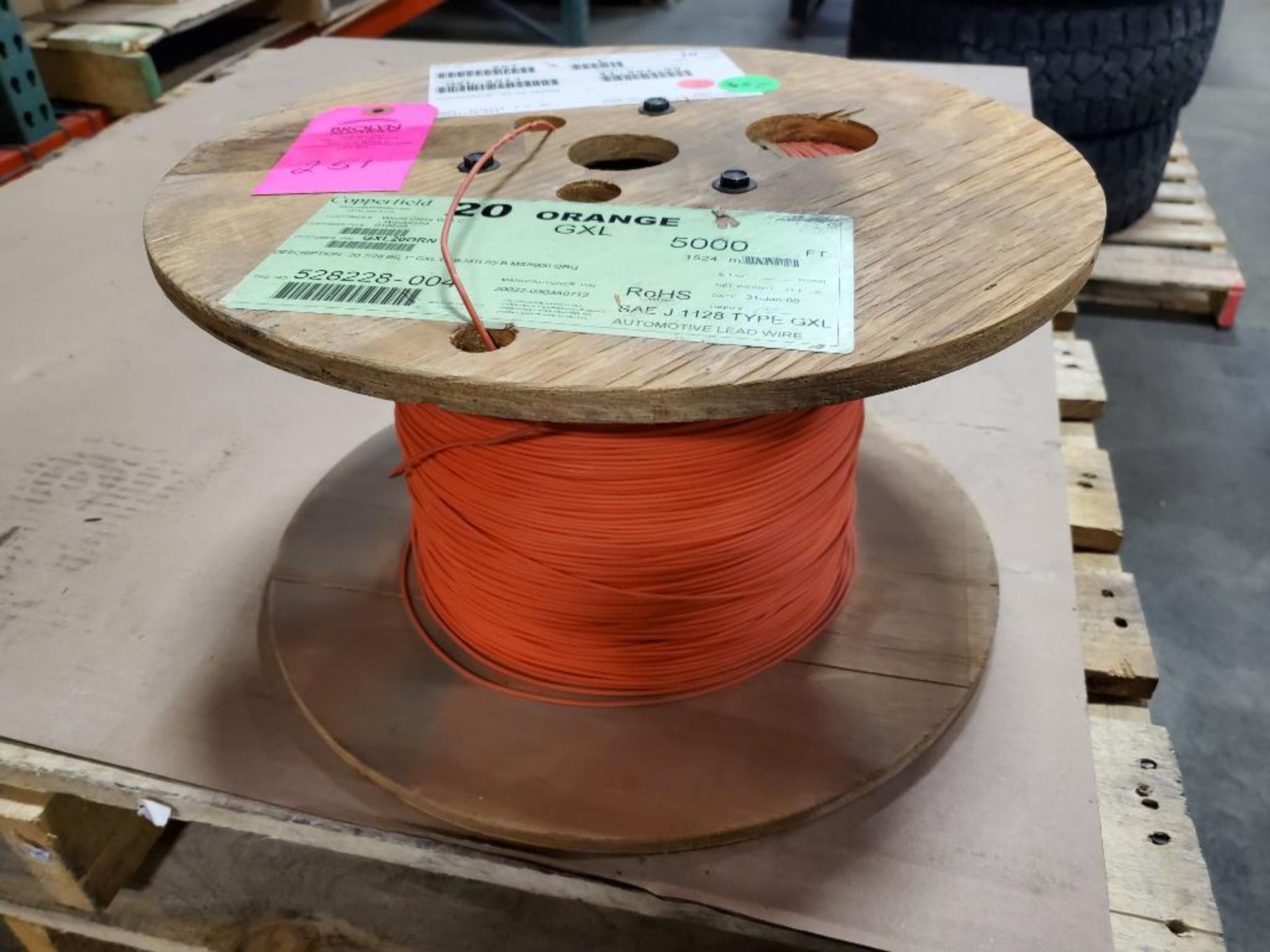 25lbs Partial roll of 20 gauge orange stranded copper wire. Gross roll weight including spool.