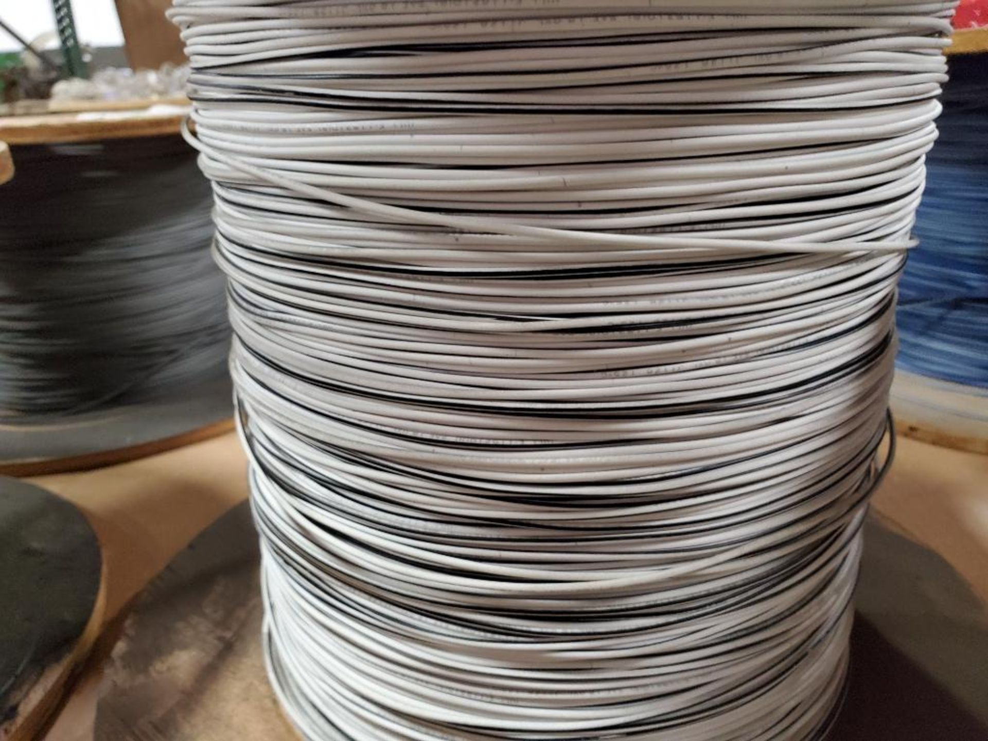 30lbs Partial roll of 18 gauge white/black stranded copper wire. Gross roll weight include spool. - Image 2 of 4