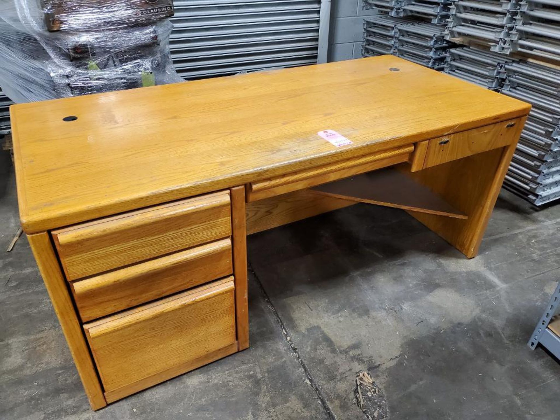 Oak wood office desk. 68in long by 33in deep by 29in tall.