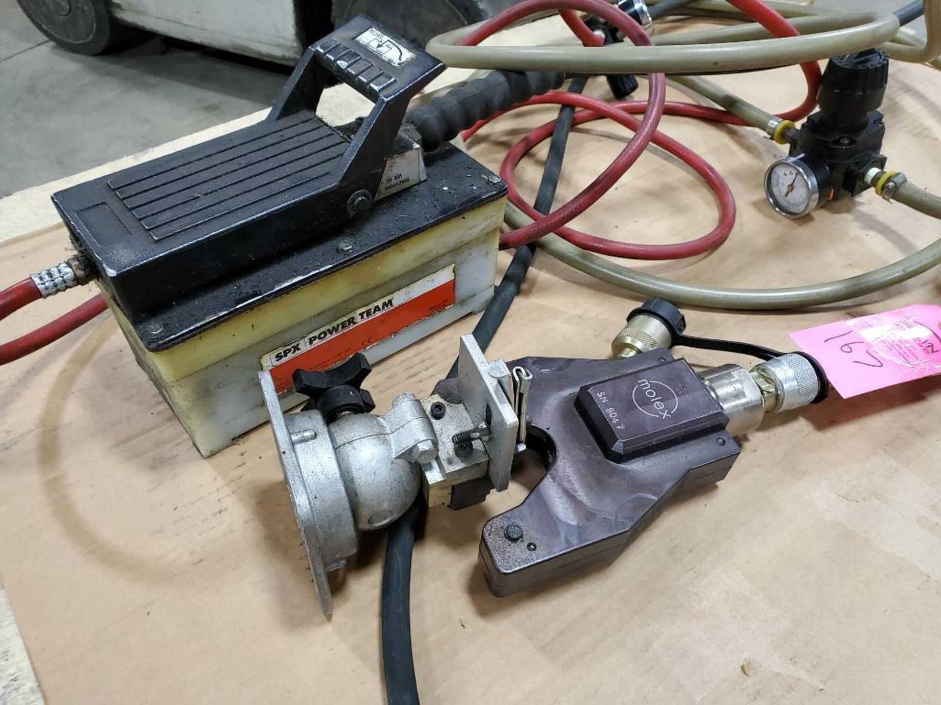 Molex hydraulic crimping unit with bench mount. Includes pneumatic SPX hydraulic power supply.