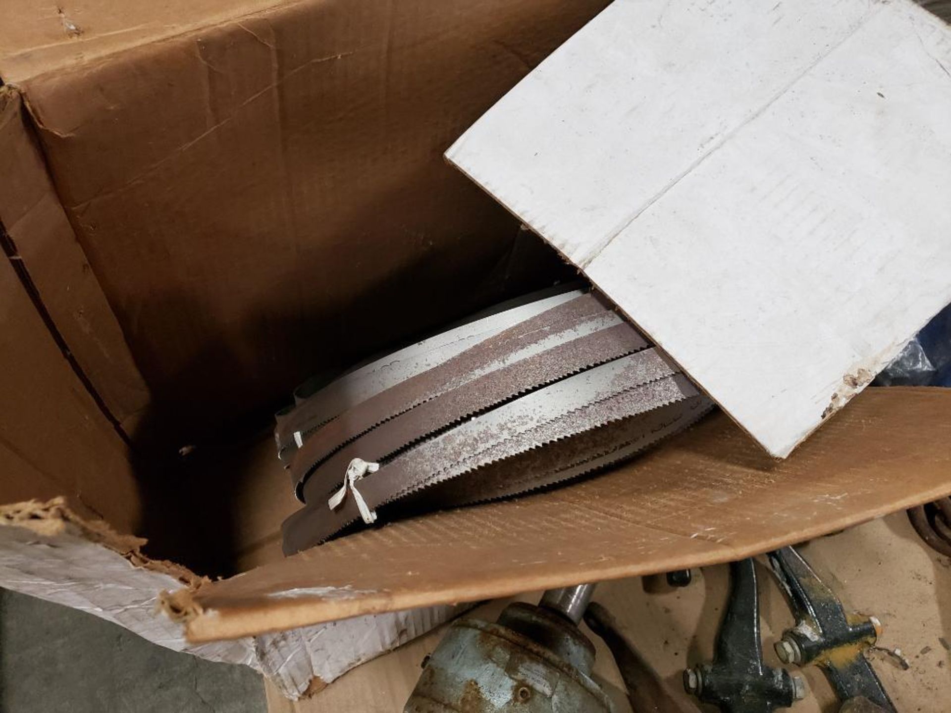 2 - Pallets worth of assorted replacement parts. Semi tire cover, cleaning wheel, pulling clamps. - Image 6 of 12