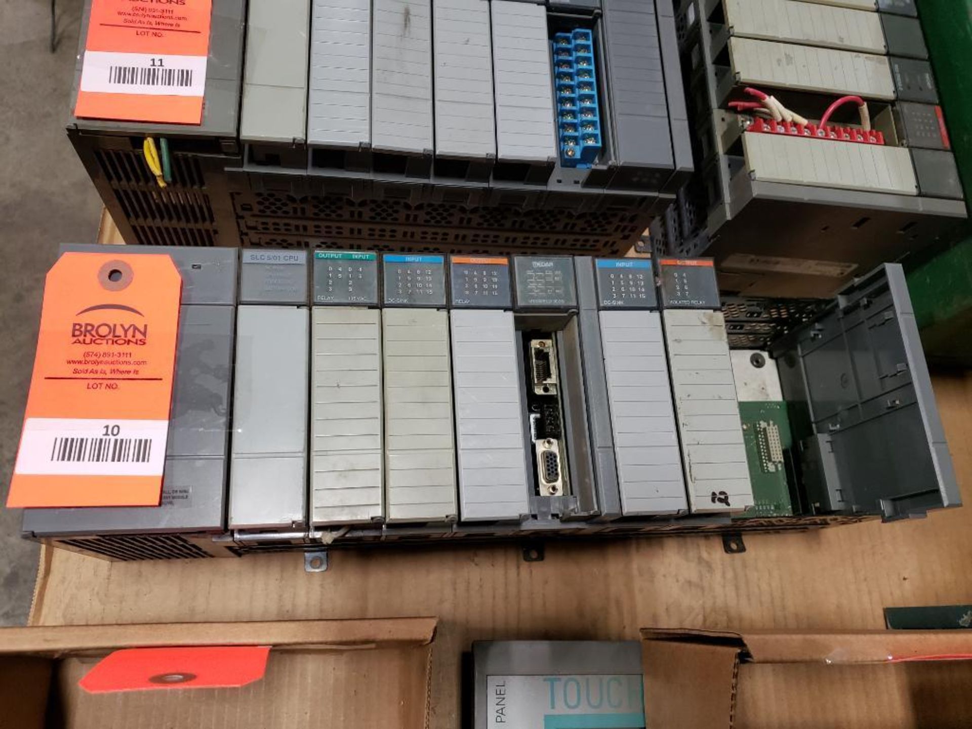 Allen Bradley SLC 5/01 CPU programmable controller rack. Input, Output, MEDAR modules.