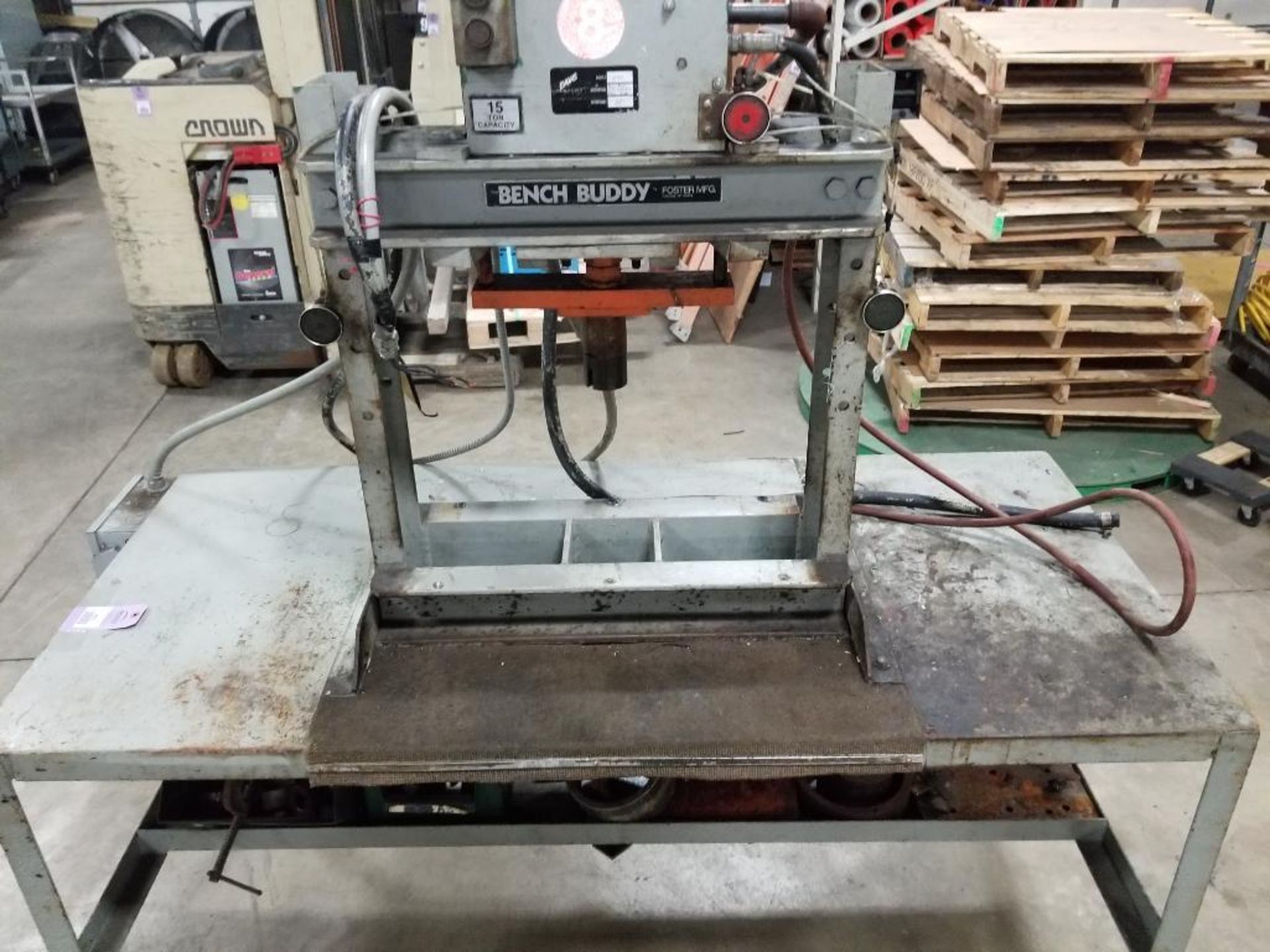 15 ton Bench Buddy hydraulic press with steel table.
