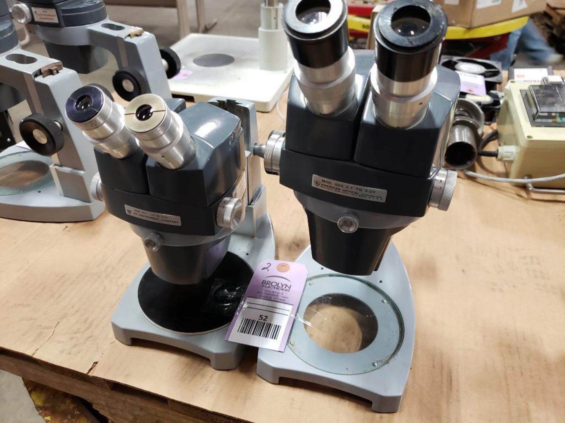 Qty 2 - American Optical Model: 569 microscope.