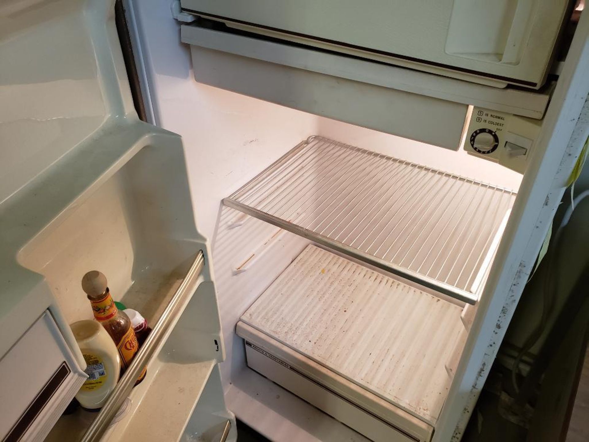 Refrigerator and microwave. - Image 4 of 4