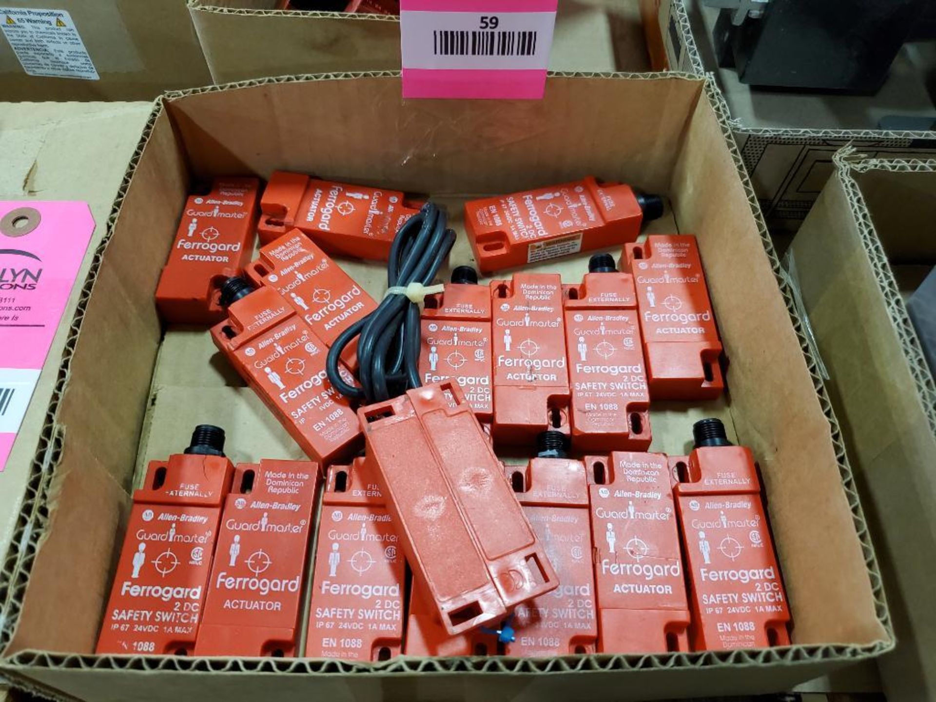 Assorted Allen Bradley Guardmaster actuators and safety switches.