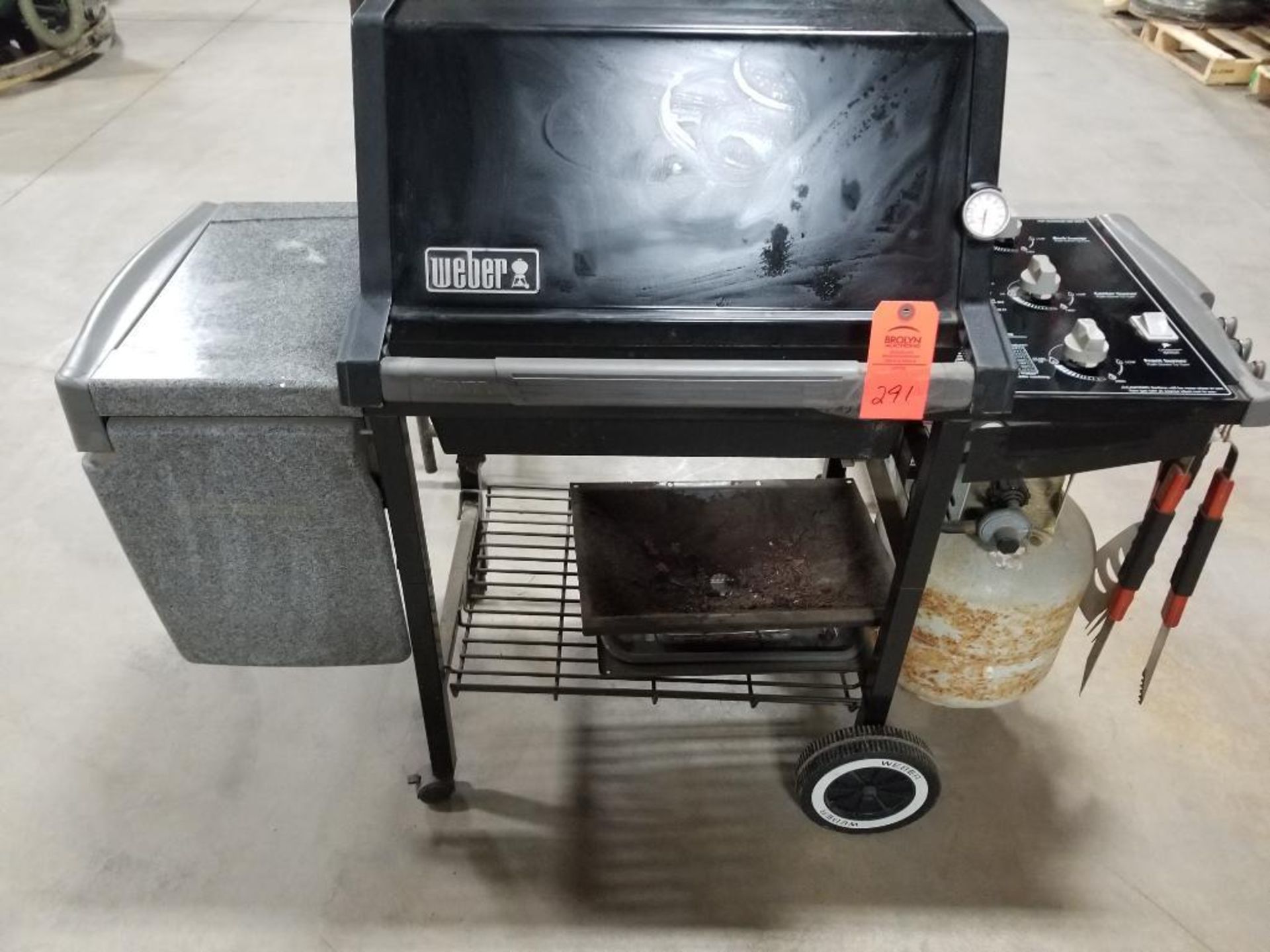 Weber Genesis Silver LP gas grill and accessories.