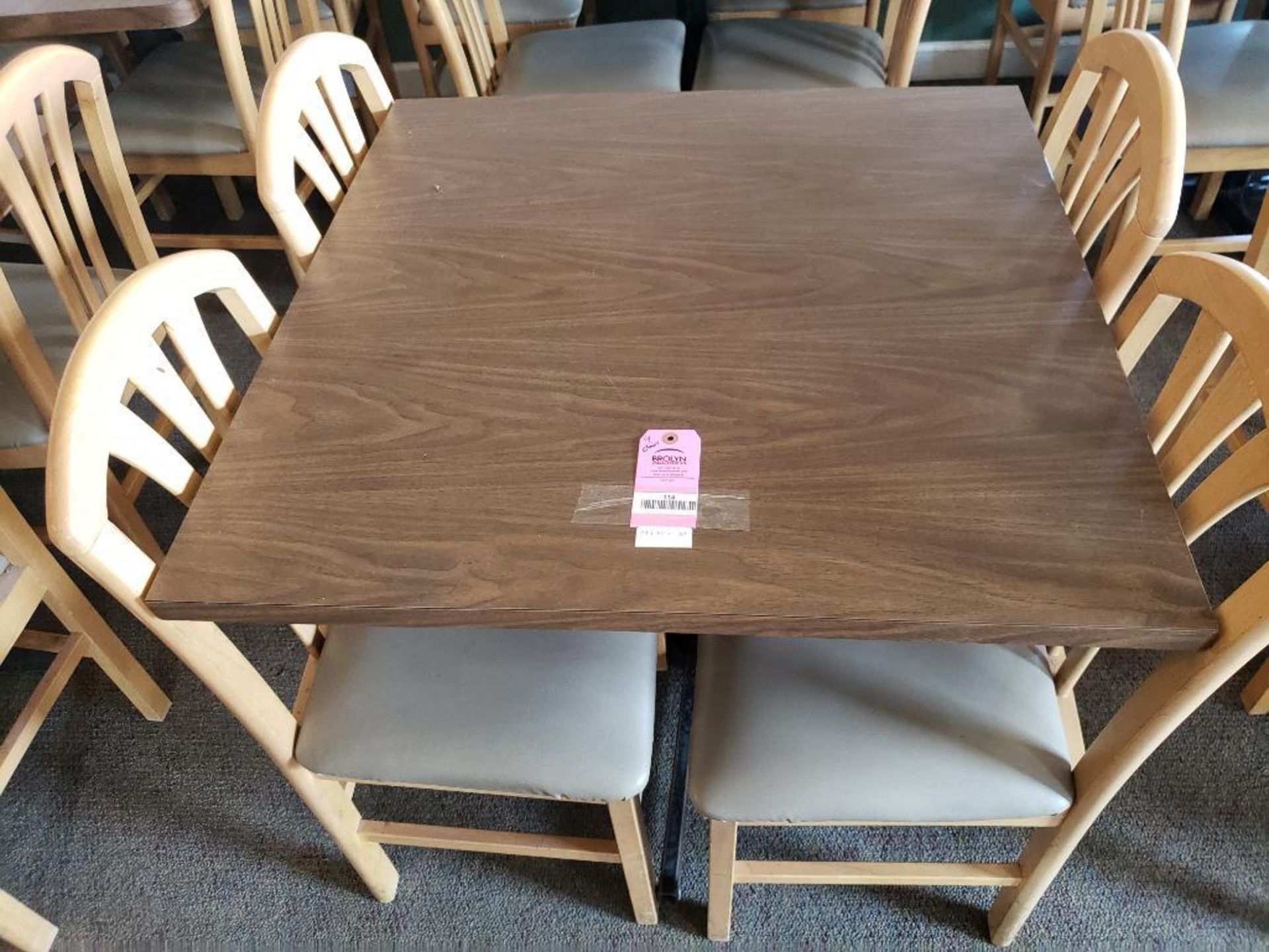 Table with 4 chairs. Table size 35in x 35in.