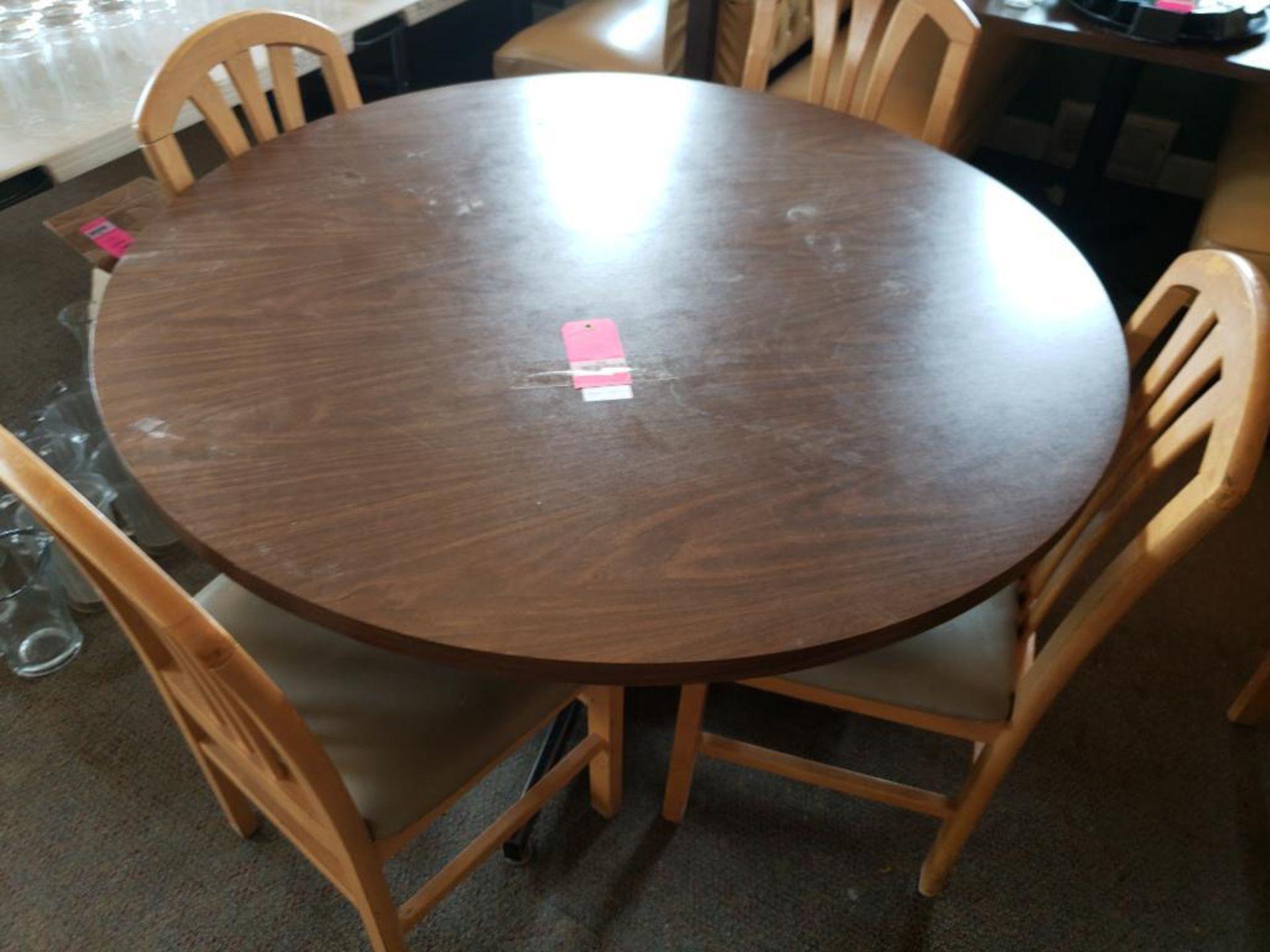 Table with 4 chairs. Table size 47in round.