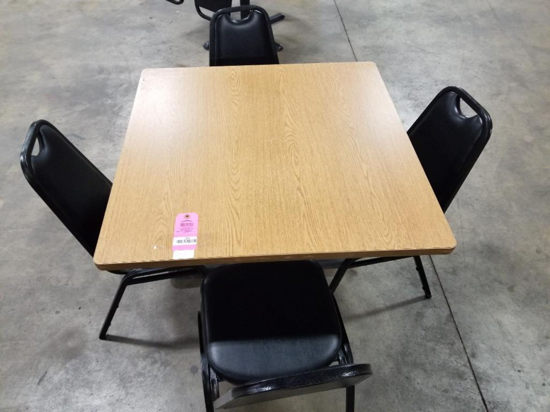 Table with 4 chairs. 36in x 36in table.