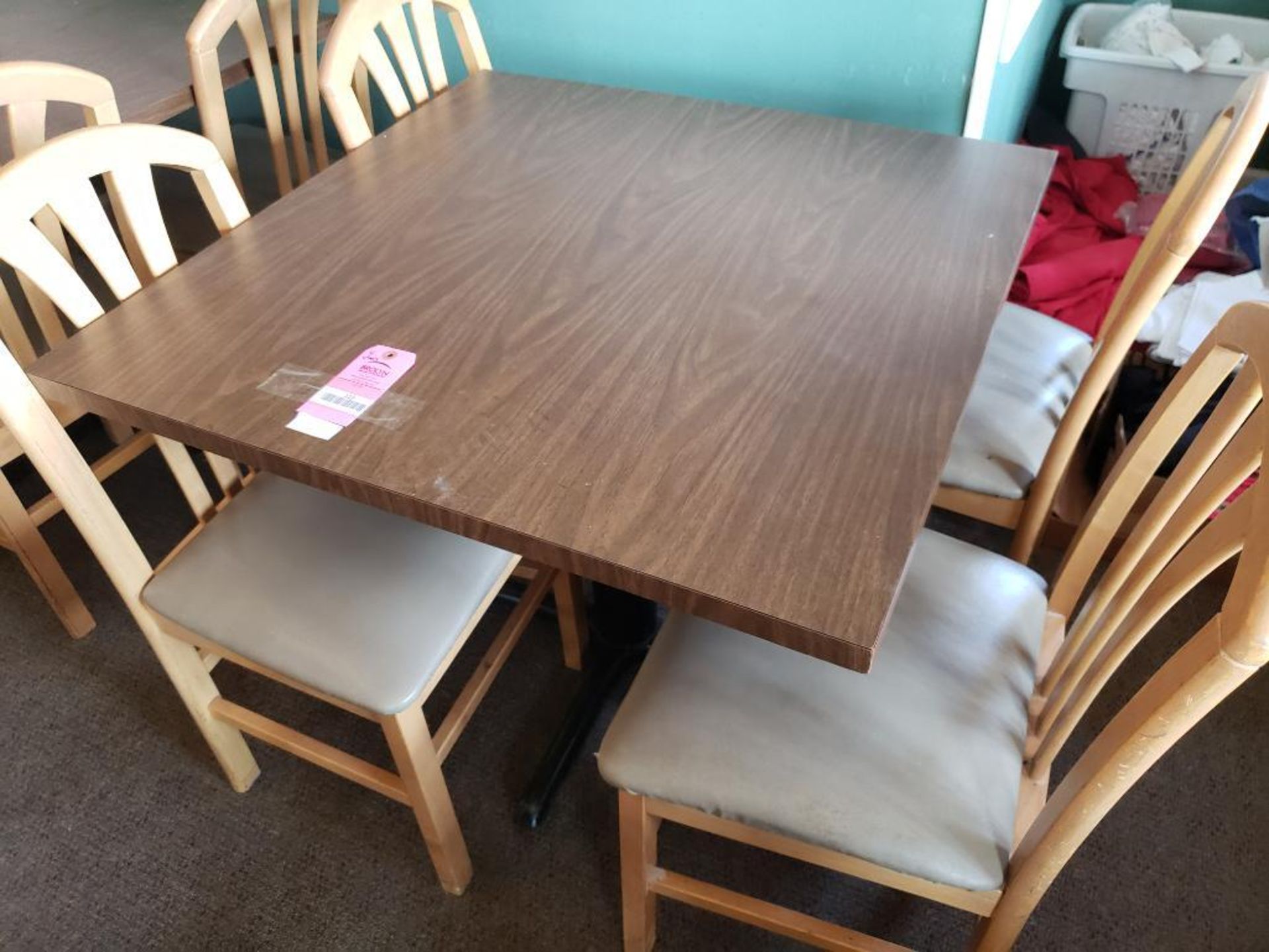 Table with 4 chairs. Table size 35in x 35in.