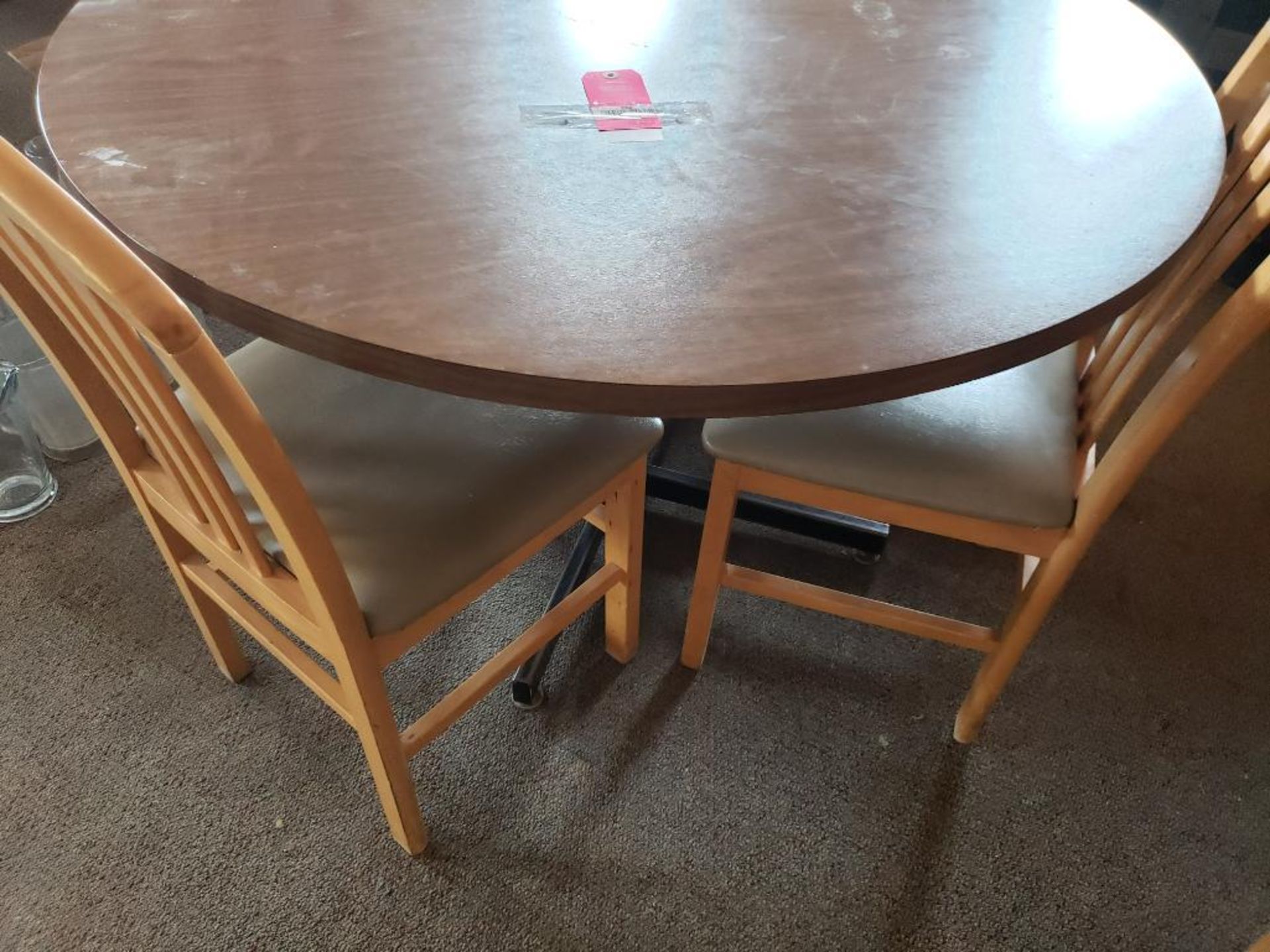 Table with 4 chairs. Table size 47in round. - Image 2 of 3