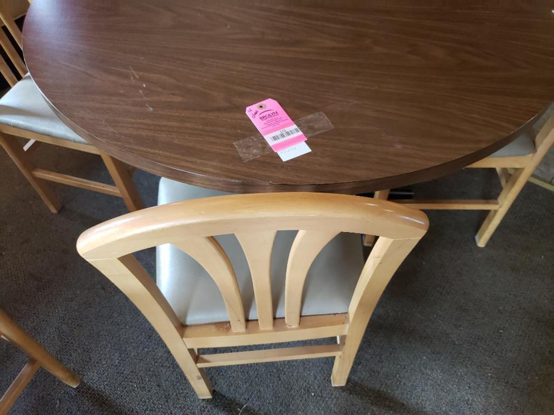 Table with 4 chairs. Table size 47in round. - Image 2 of 4