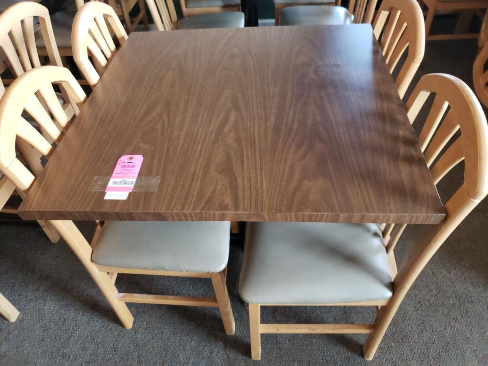 Table with 4 chairs. Table size 35in x 35in.