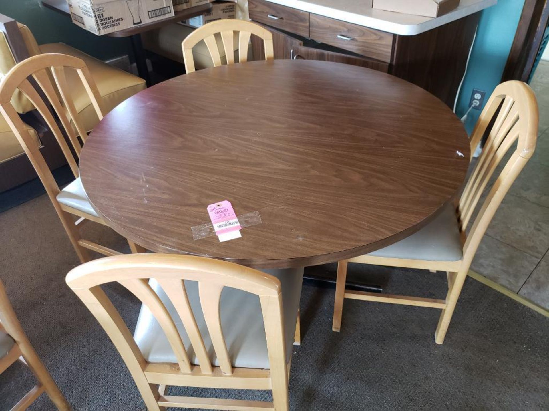 Table with 4 chairs. Table size 47in round.