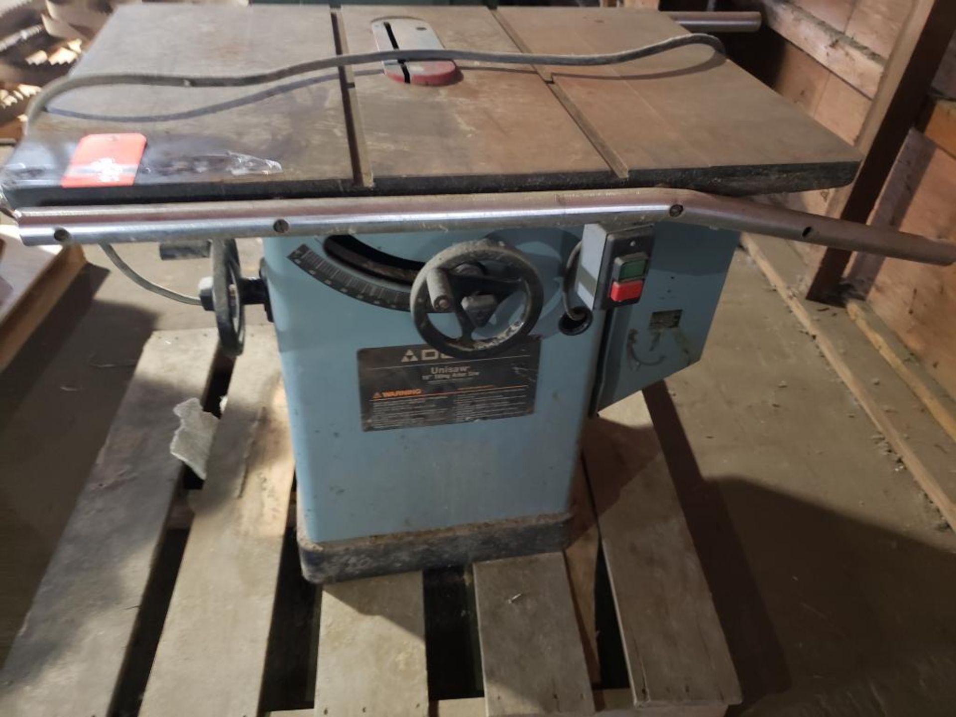 Delta Unisaw 10" tilting arbor saw.