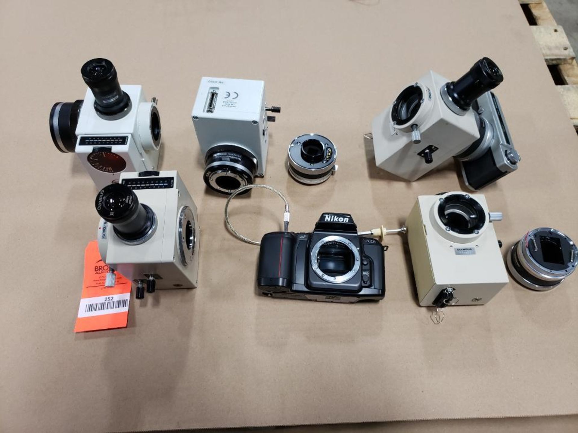 Assorted microscope camera attachments. Olympus, Nikon.