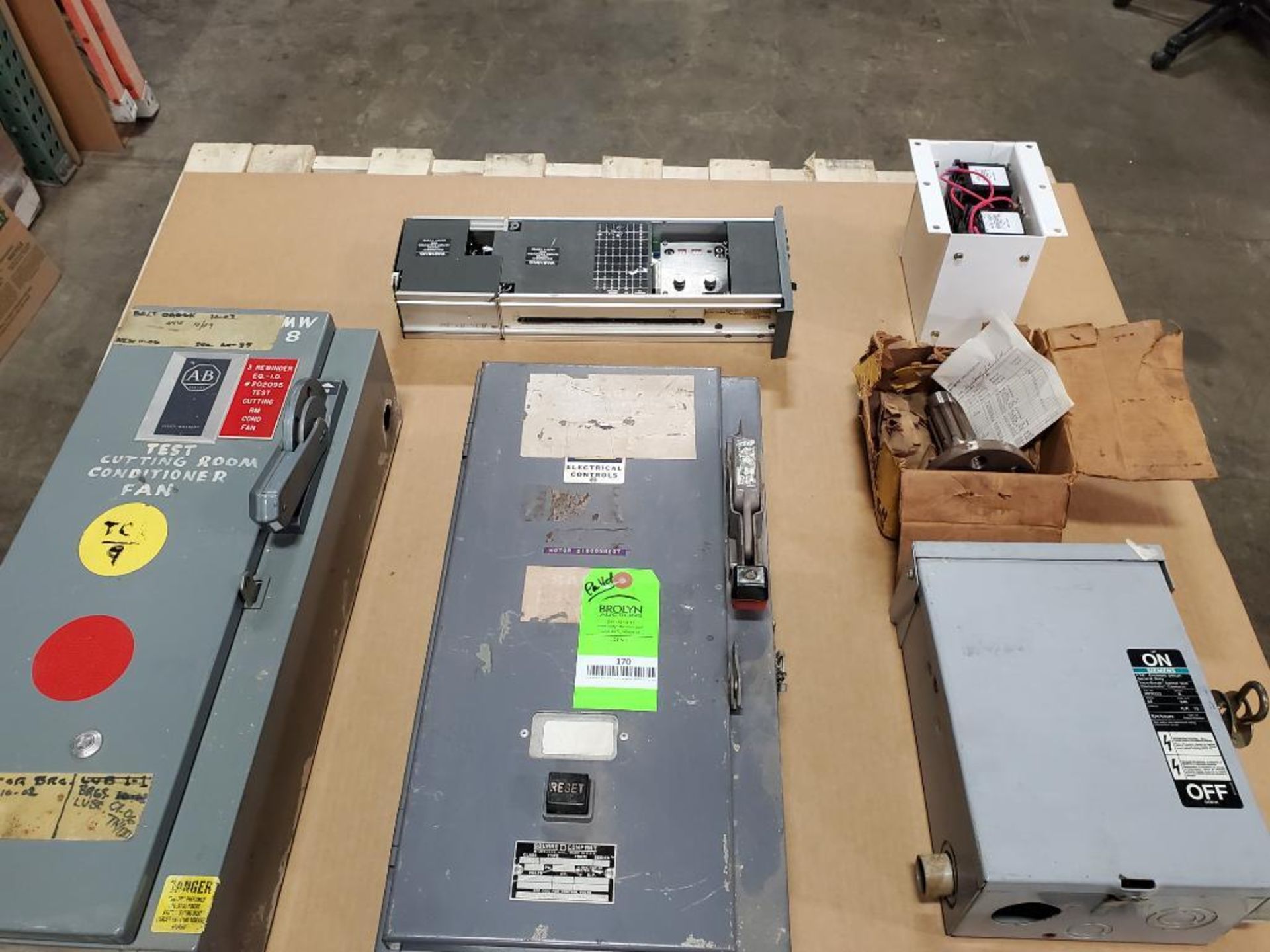 Pallet of assorted electrical safety switch, motor starter, transformer. Allen Bradley, Square-D.