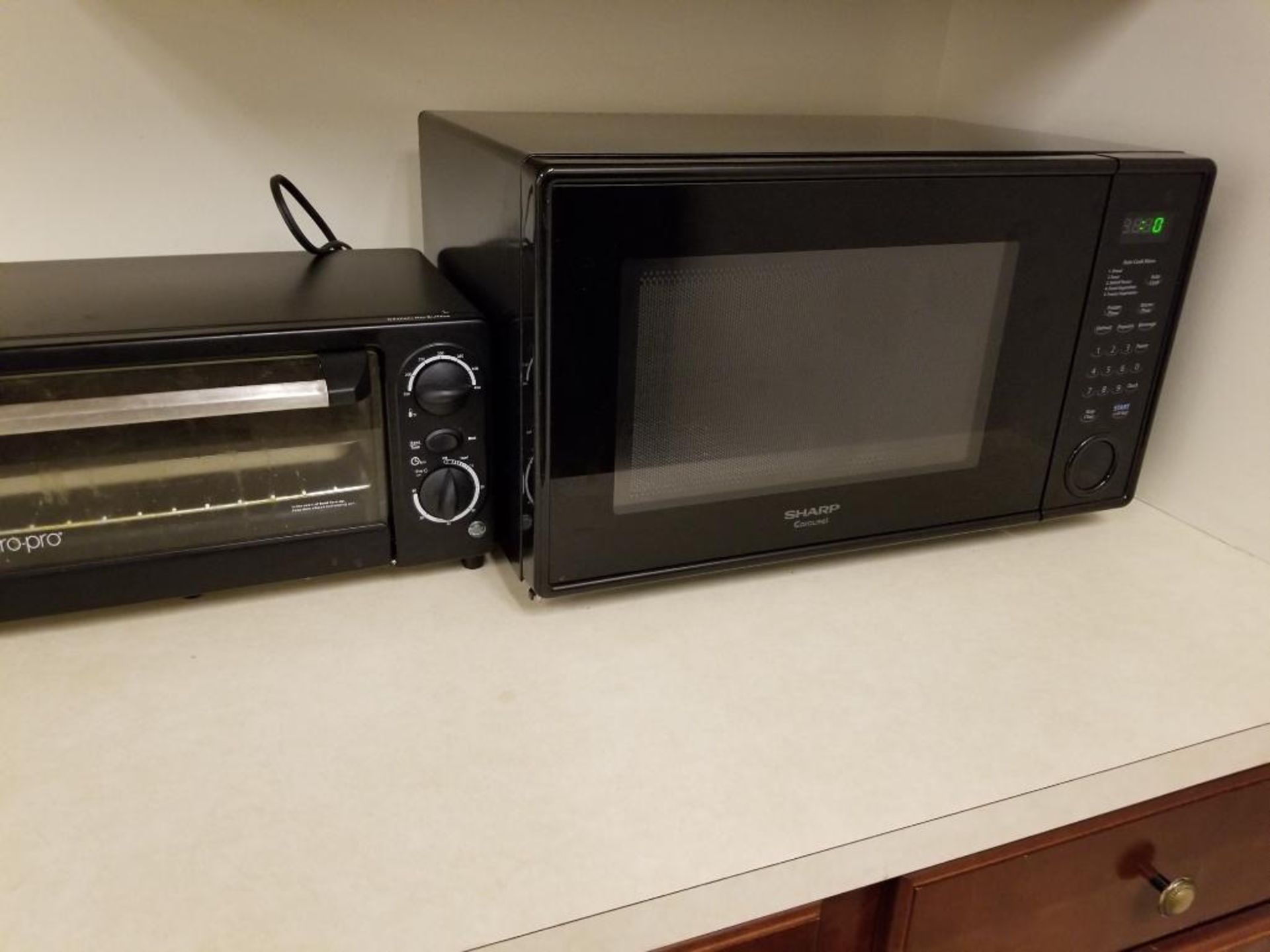 Contents of break room. (3) Tables, (4) Chairs, Microwave, small oven. - Image 2 of 7