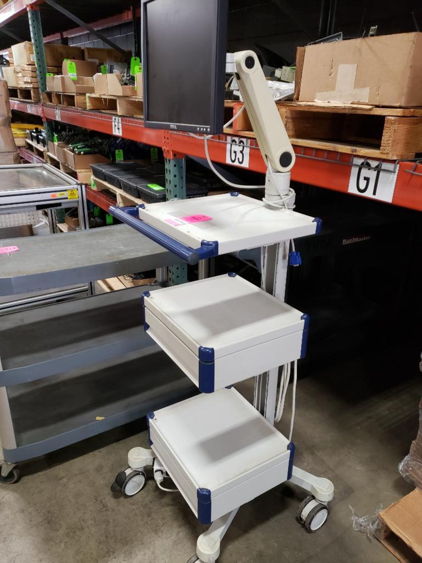 Rolling medical cart. Dell monitor, 22x22x66 WxDxH.