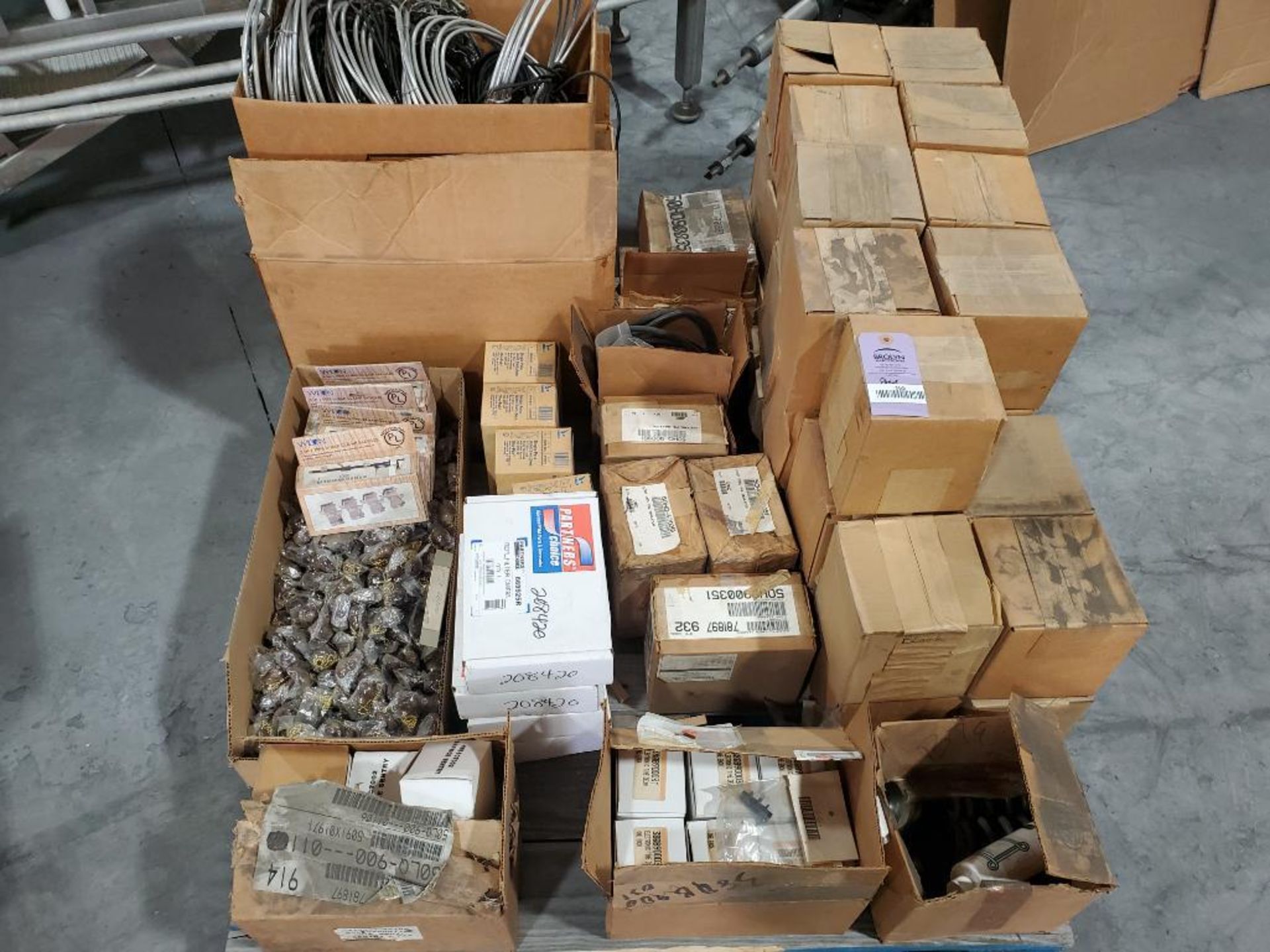 Pallet of assorted parts.