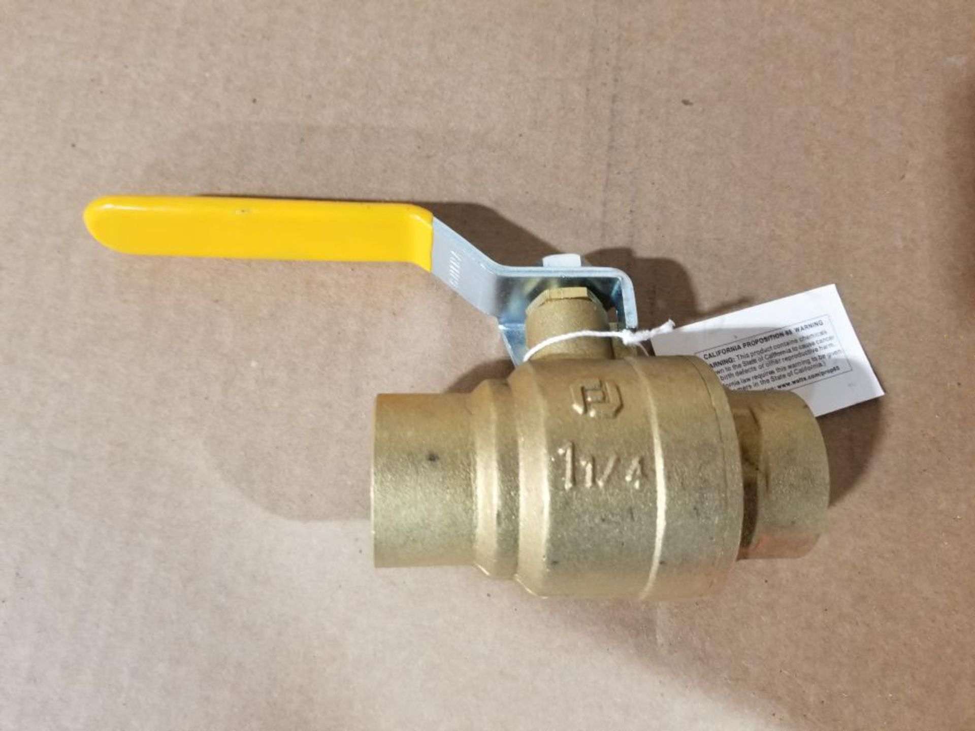 Qty 40 - Watts 1 1/4in brass solder on shut off valve. Part number 1-1/4-FBVS-3C. New in bulk box.
