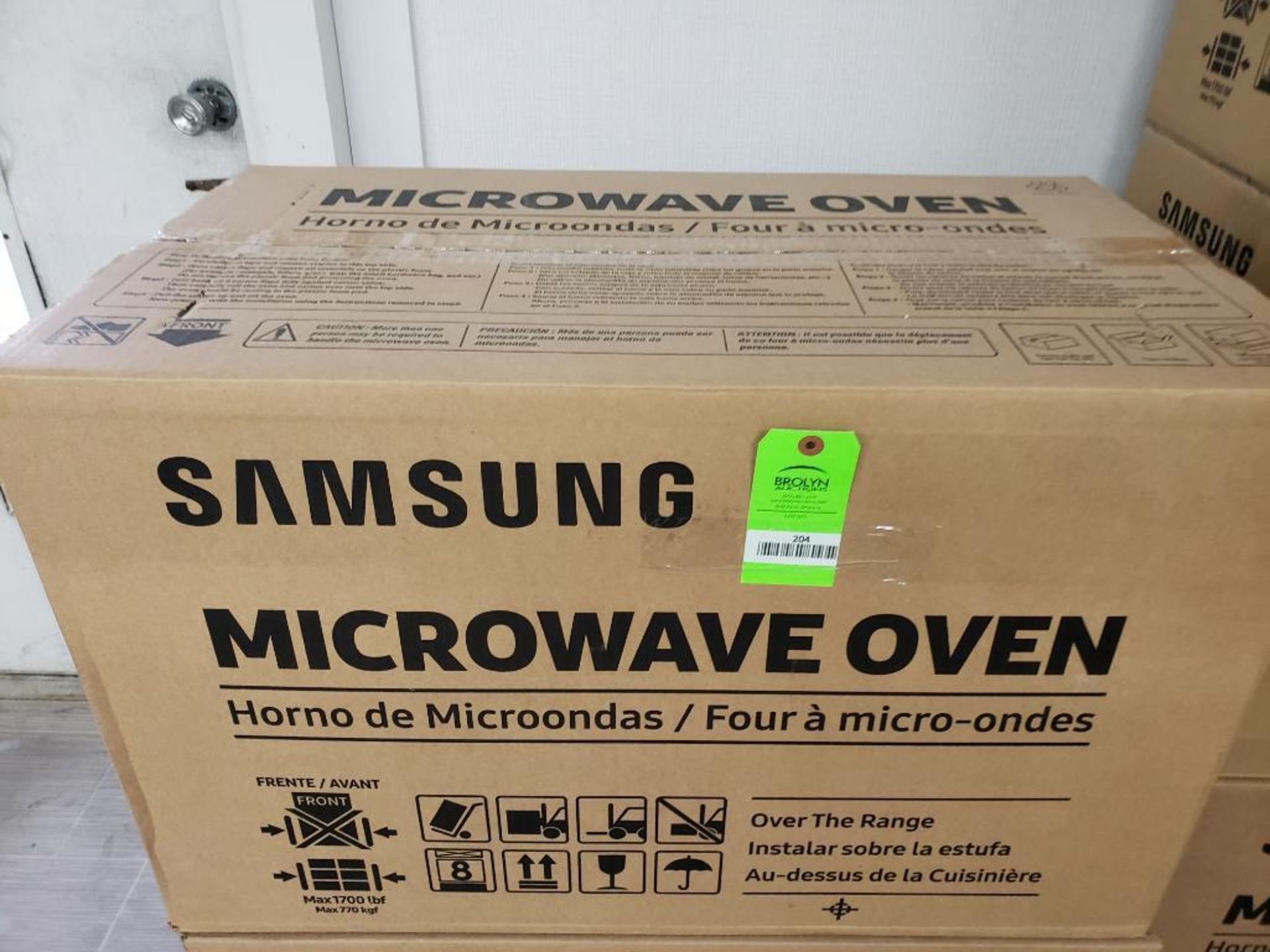 Samsung over the range microwave oven. Model number ME17R7021ES. New in box.
