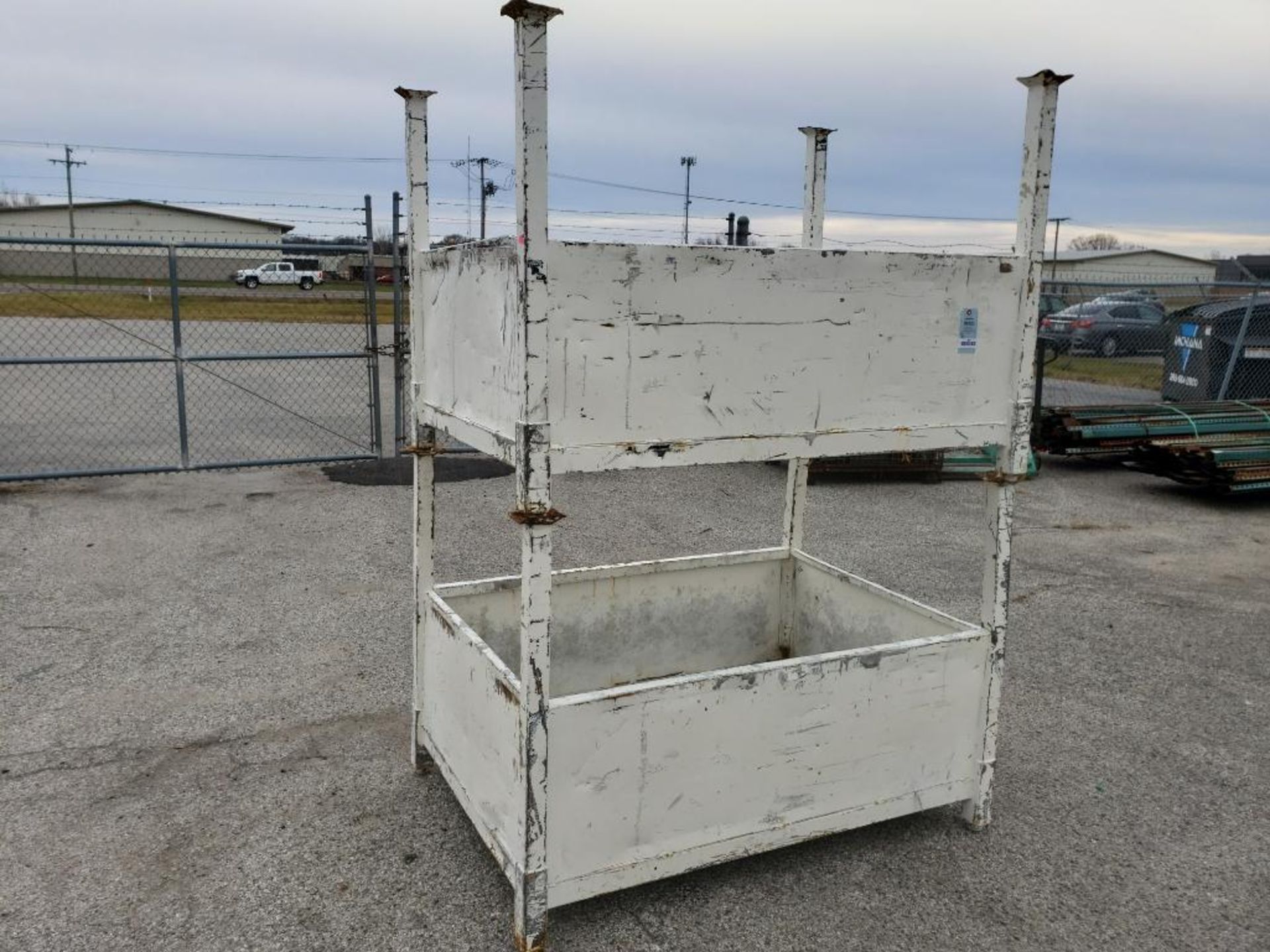 Qty 2 - Steel stackable containers. 60in x 41in x 21in container. 44in with legs.