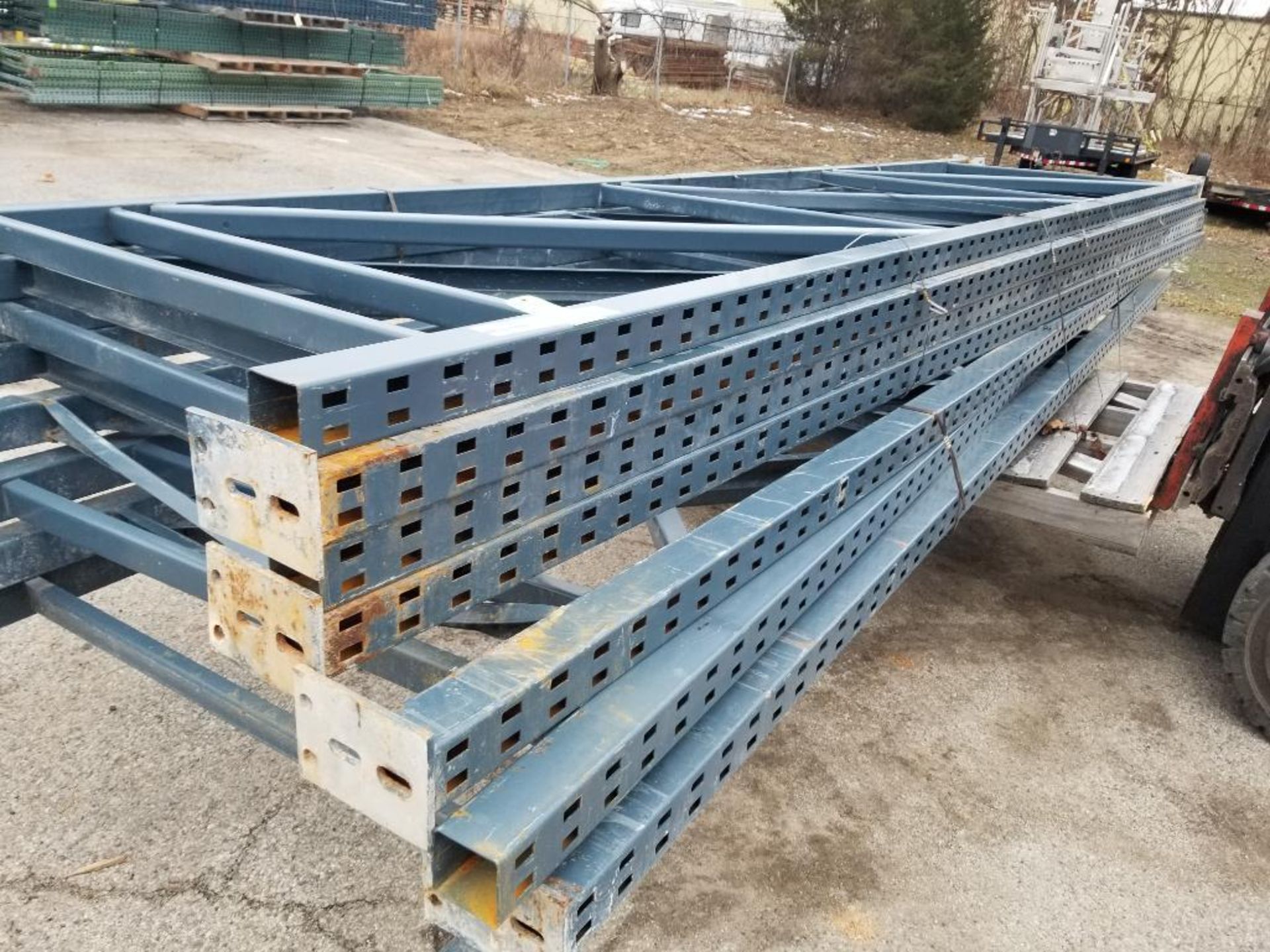 Qty 8 - Pallet racking uprights. 210in tall x 49in wide.