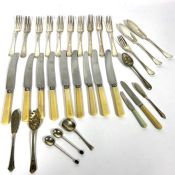 A two drawer canteen table; 20th century, together with a large assortment of assorted flatware