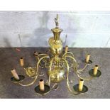 Two vintage Flemish style brass chandeliers, one with six lights, 80cm diameter, 60cm high; the