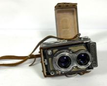 A Yashica 44 camera, circa 1960; together with a Canon Eos 300 and 28-80mm lens; and a Canon EF 75-