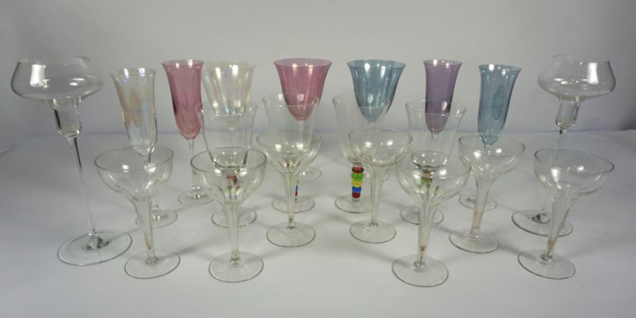 Assorted glassware, including seven pale pastel coloured glasses, a set of four goblets with