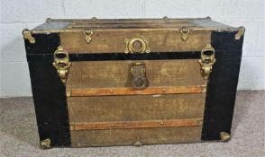 A vintage leather, canvas and wood slatted trunk, 84cm long; together with a modern ‘fan’ standard