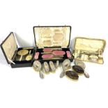 Assorted vanity cases, including cased enamel and silver backed hair brushes etc, once with pink