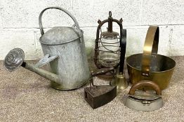 A vintage brass preserving pan, together with assorted items including two irons, a galvanised