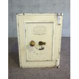 A useful cast iron safe, by C.Price, the locking door, marked ‘fireproof’, includes a single