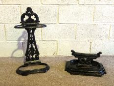 A Victorian cast-iron stick stand, together with a similar cast-iron boot scraper