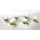 A set of six Royal Worcester coffee cans and saucers, decorated with roses; together with assorted